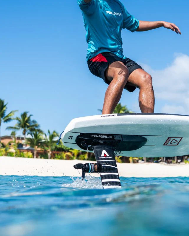 Armstrong Xdrive foil with a Foil Drive eFoil electric motor propelling an individual over the water 